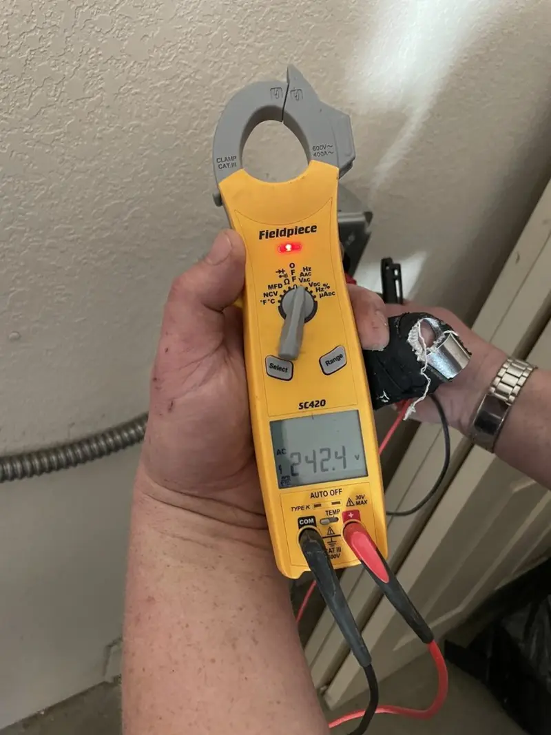 Voltage testing with clamp meter during Circuit Breaker Repair in Rolesville